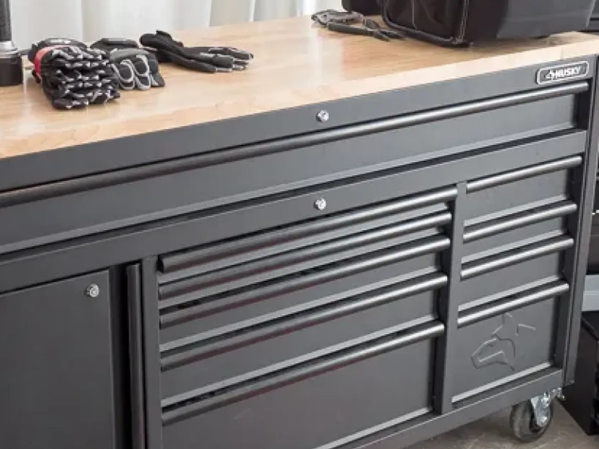Husky matte black mobile workbench with wood top and drawers